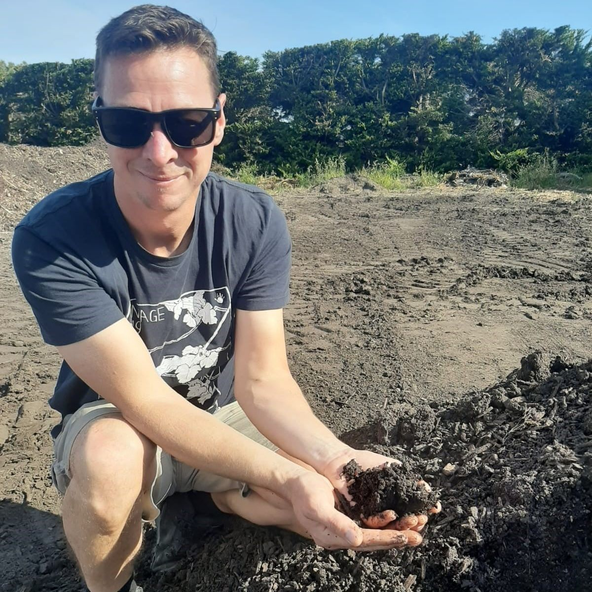 Wine maker testing soil health