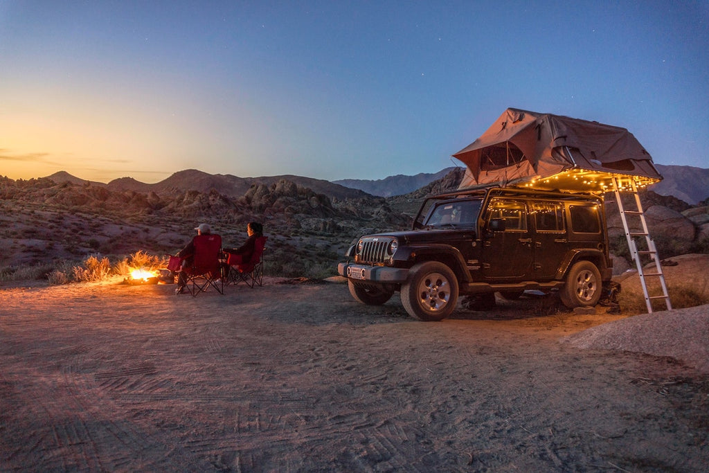 A rooftop tent in the desert
