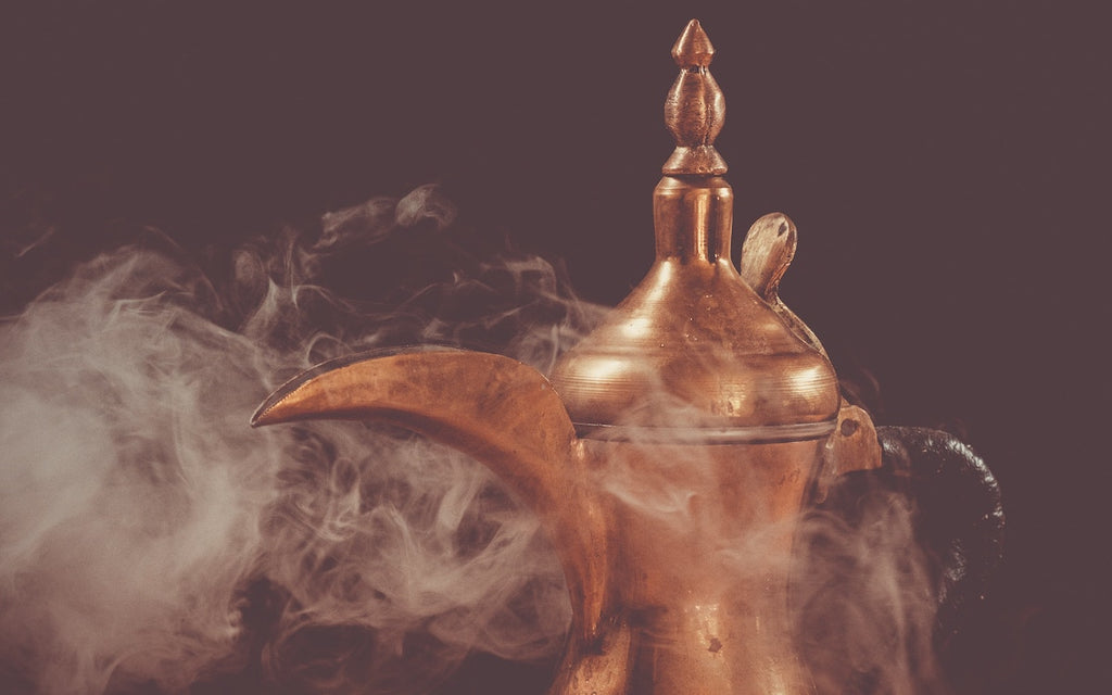 An Arabian coffee pot with steam