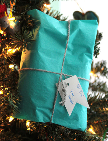 package wrapped with handspun twine