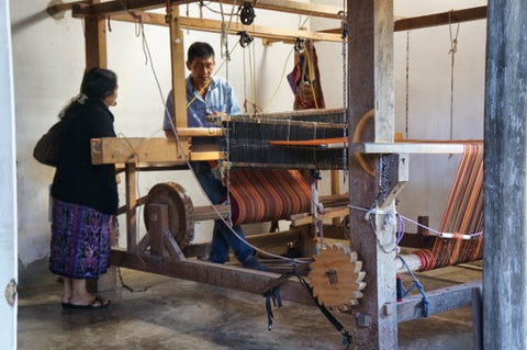 weavers at loom