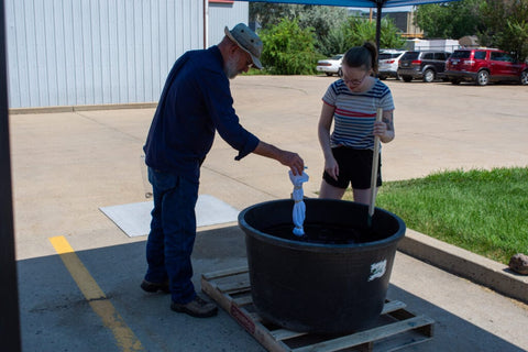 white shirt going into vat