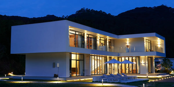 Modern House At Night With EcoFlow Delta Pro Plugged Into EcoFlow Smart Home Panel