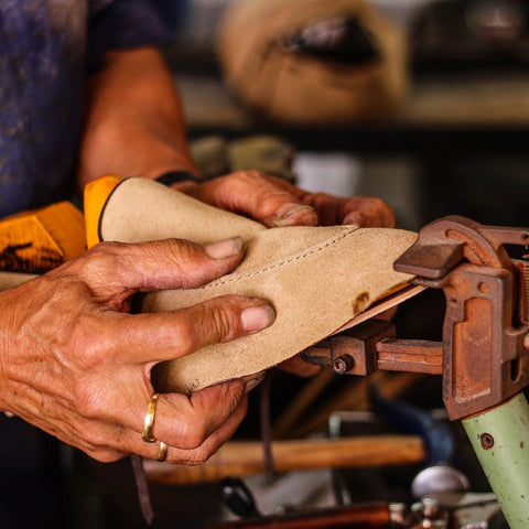 a craftsman making a loafer