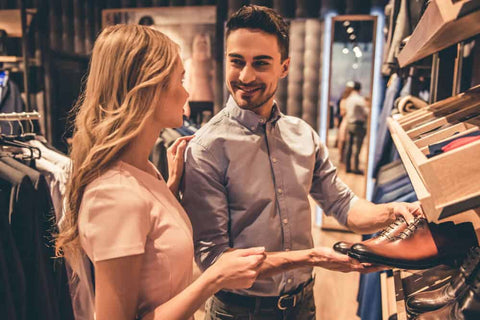 A couple shopping for a shoe