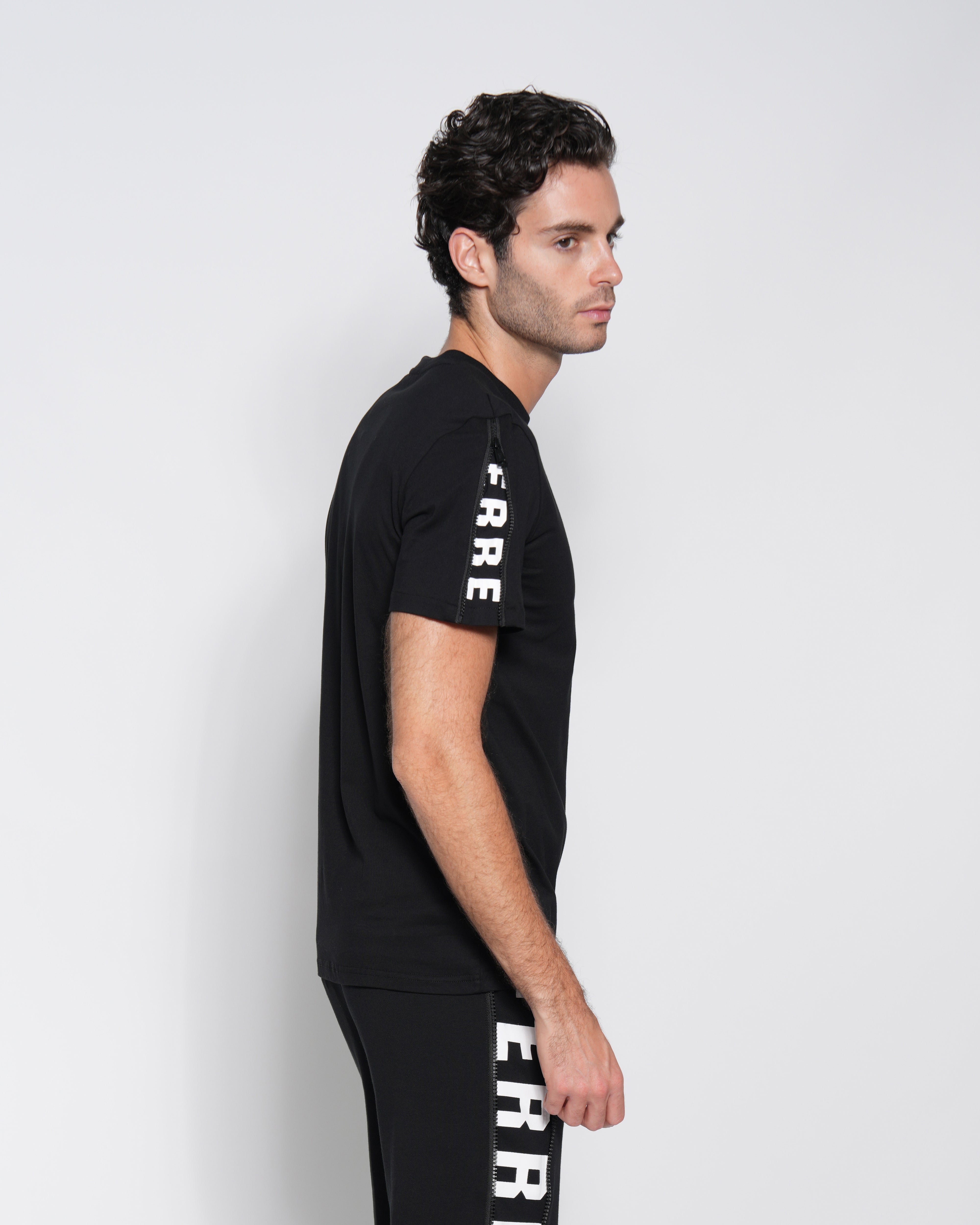 Calvin Klein Jeans logo tape shoulder t-shirt in black, ASOS