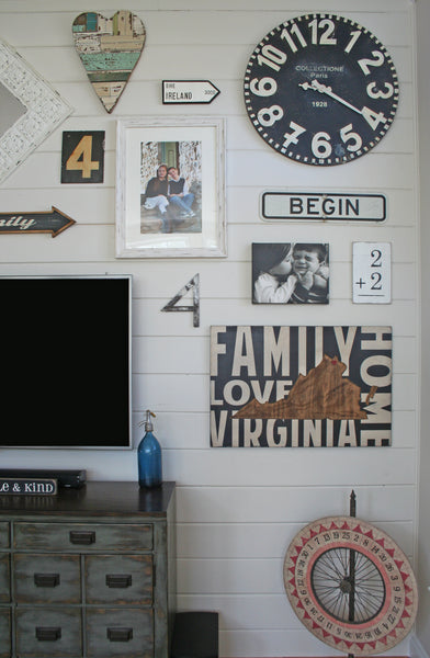 large shiplap gallery wall with TV. photo wall, accent wall, home decor
