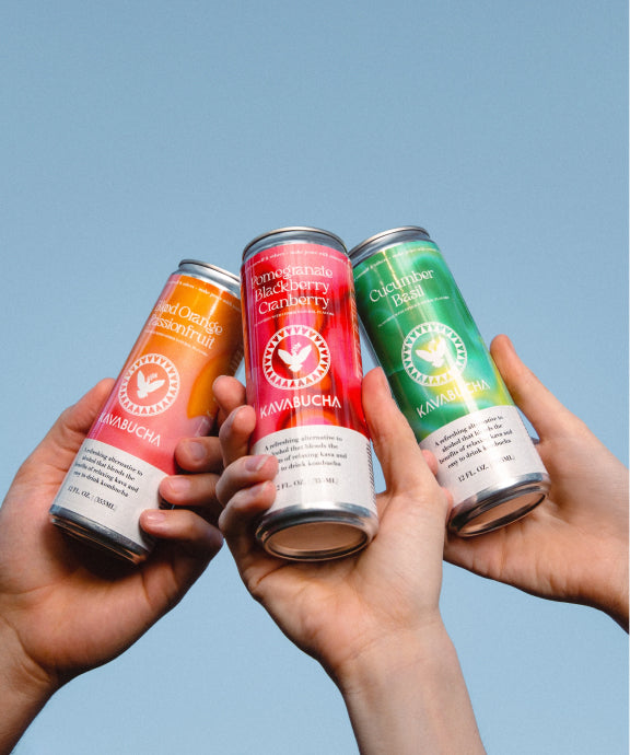 Holding up all the kombucha cans in the sky.
