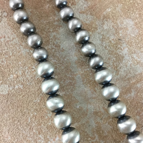 Savvy Collector » Strand of Graduated Silver Beads by NavajoNavajo