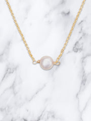 Marina Pearl Necklace on marble