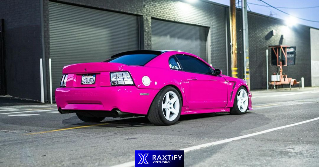ford mustang wrapped in rose pink vinyl wrap