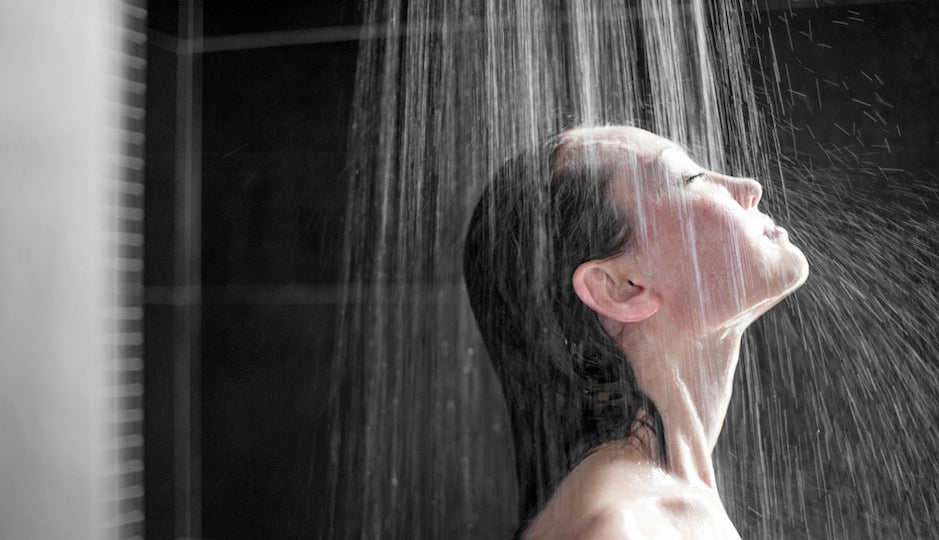 a woman taking hot shower
