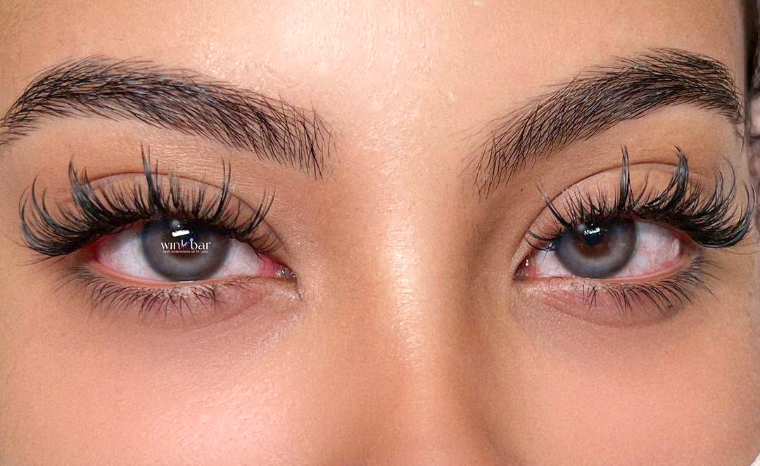 'Wispy' lash style, featuring delicate and feathered lashes that create an elegant and textured look for eyelash extensions or makeup, perfect for a soft and romantic appearance