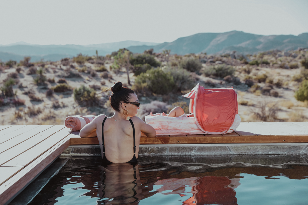 new mom relaxing in pool