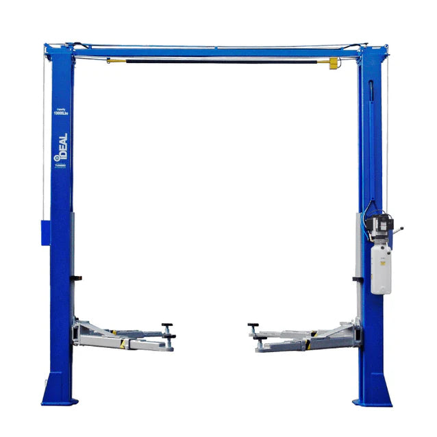 Blue iDEAL TP10KAC-DX 2-post automotive lift shown from the front, featuring 10,000 lb lifting capacity.