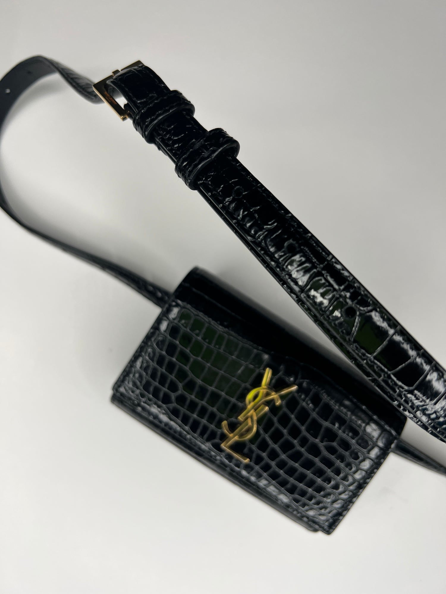 lou belt bag in crocodile-embossed leather