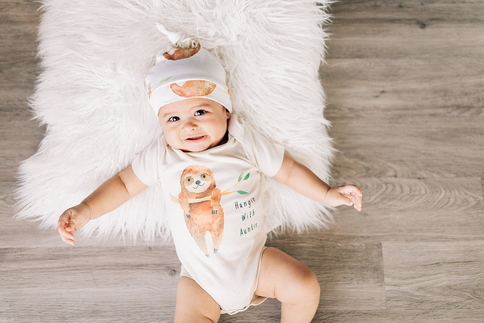 baby in a sloth costume