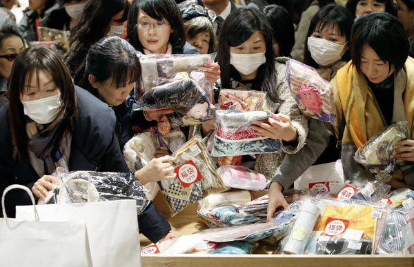 Shoppers grab fukubukuro lucky bags in Osaka
