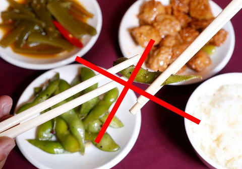 etiquette of using chopsticks B