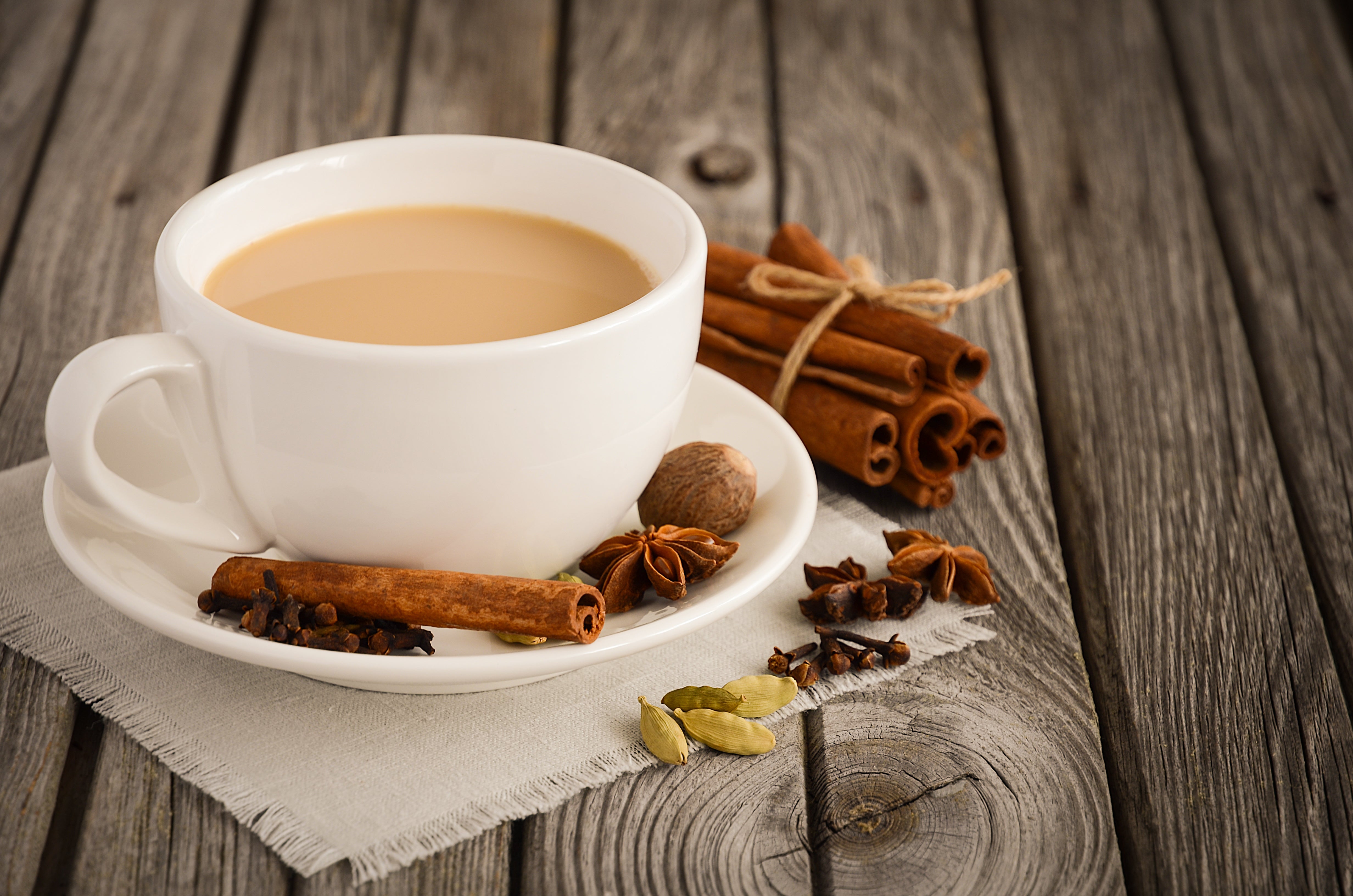 A cup of masala chai with cinnamon