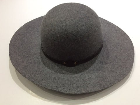 a broad brimmed hat