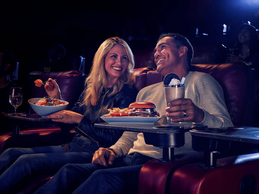 couple eating at a theater