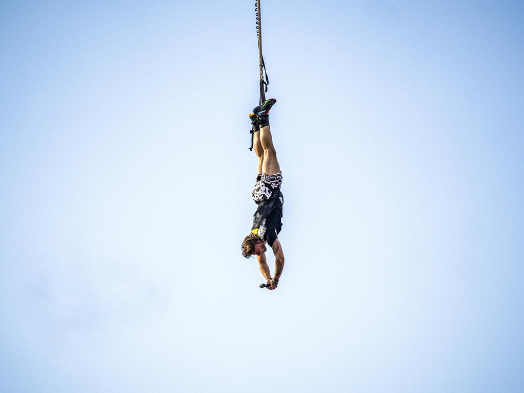 man bungee jumping