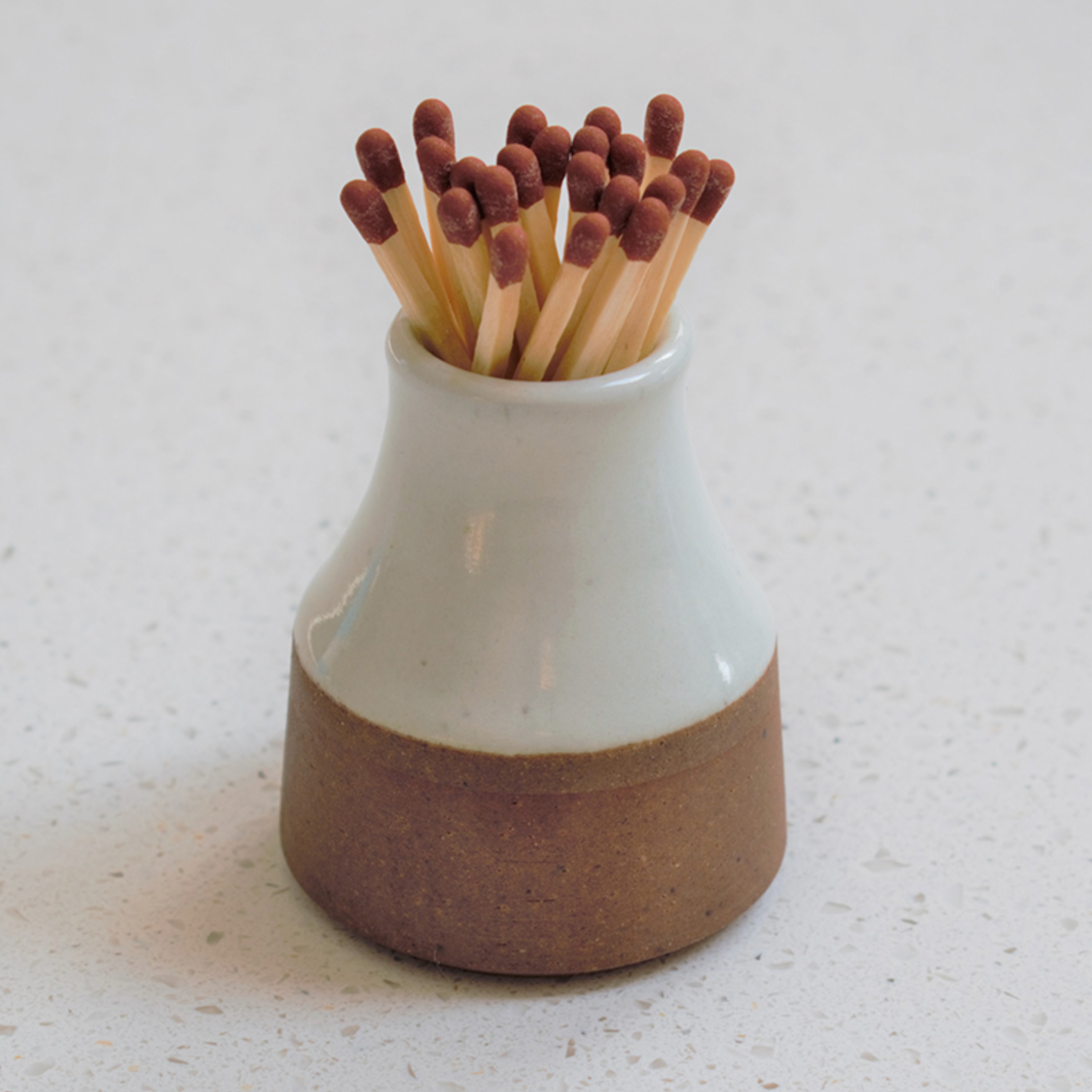 Alice milk bottle match striker with matches