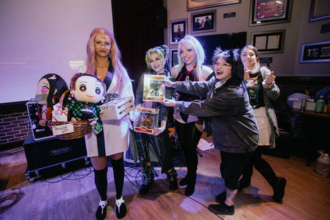 Cosplay Panelists posing with Kait Osamu (Contest Winner)