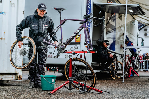 Person washing bicycle