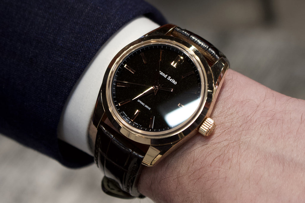 Joe Kirk's Grand Seiko Black dial watch on wrist