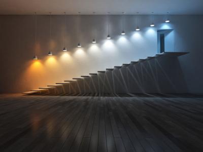 illustration des différentes couleurs d'éclairage avec des lampes au-dessus d'un escalier montant, du blanc chaud au blanc froid