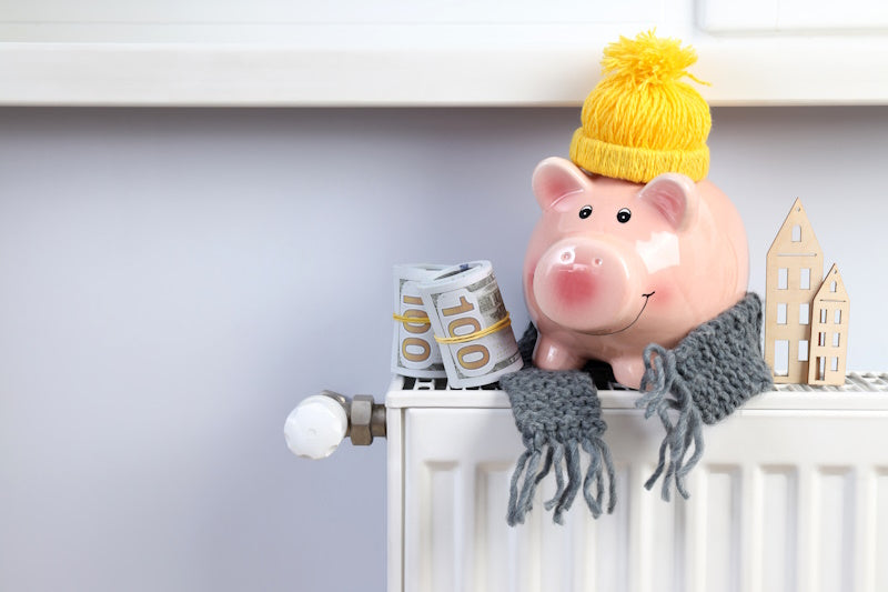 tirelire en forme de cochon sur un radiateur 