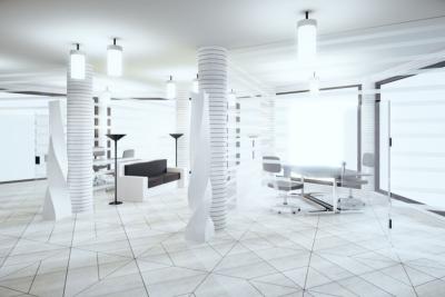 grand bureau blanc éclairé par des suspensions avec ampoules au plafond