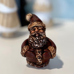 Learn to sculpt a clay Santa!