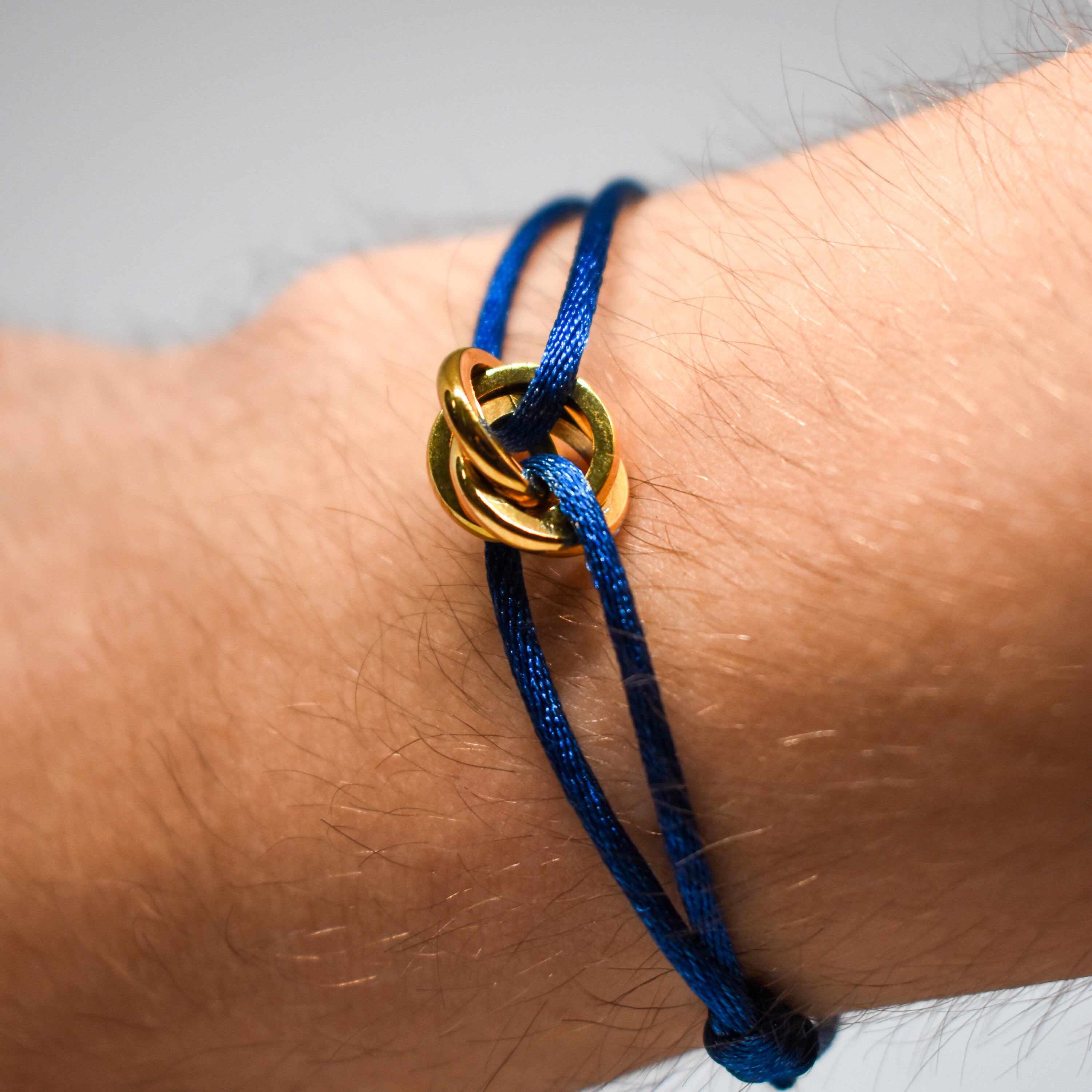 blue Cartier trinity bracelet in 2023
