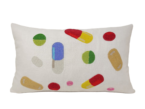 2.     Happy Pill Pillow, Pop Art Lumbar Pillow     Amore Beaute chill pill pillow cover is fun and trendy! Colorful pill art is playful and bright on a white linen pillowcase. This cheeky, hand beaded pop art pattern will add a bit of humor to your space. Perk up your sofa or bed with the right pharmaceuticals. The embellished pillow shows affair with all things medicinal to your pillowscape. Take just one or follow our professional recommendation to mix the whole assortment. Enjoy shopping for your favorites from the collection.   