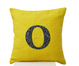 Handmade yellow throw pillow with monogram