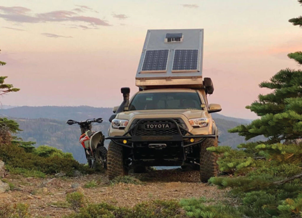 Toyota Tacoma Camper with a Hitch Mount Motorcycle Carrier