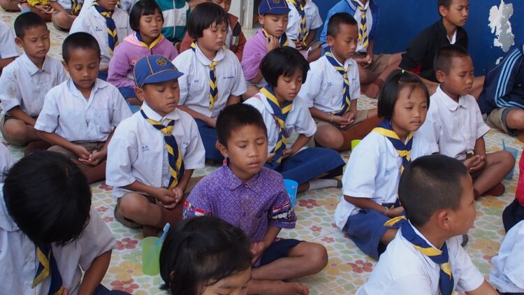 SATI non profit group of children practicing meditation