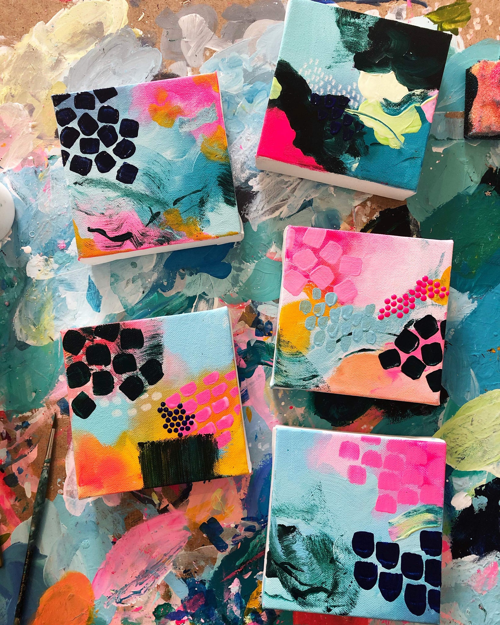 minin abstract paintings with pinks and blues
