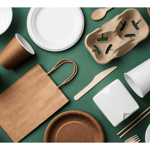 Compostable packaging examples green background