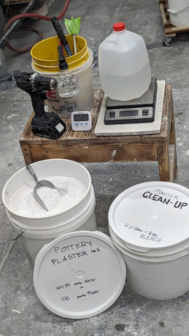 Everything prepped before starting to mix plaster. Highlight the cleaning bucket