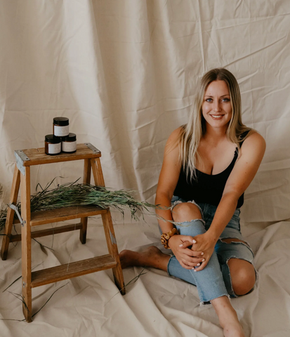 Eternal Tallow Founder Kayla Sitting with Products