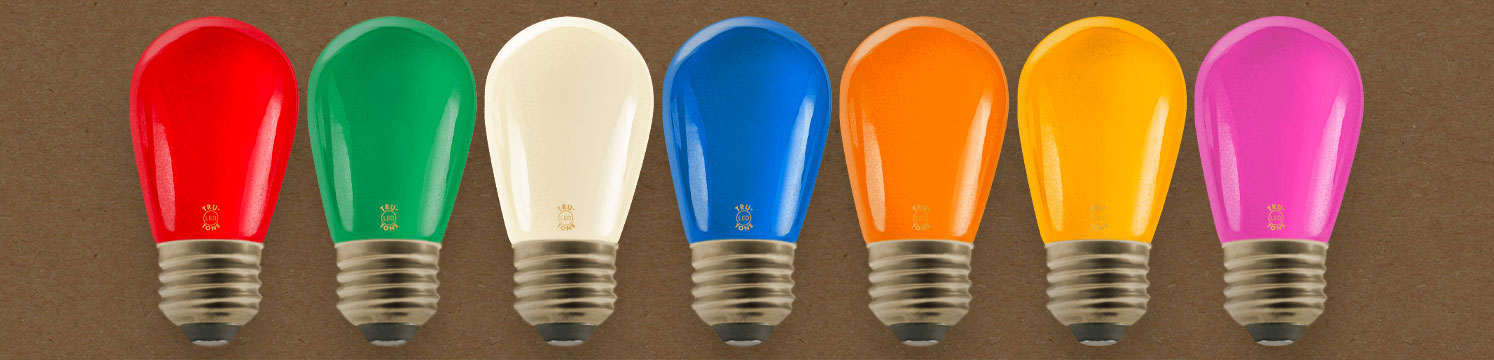 Illuminated Tru-Tone S14 vintage-style light bulbs in a rainbow of colors
