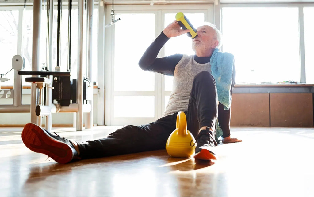 Man hydrating after kettlebell workout