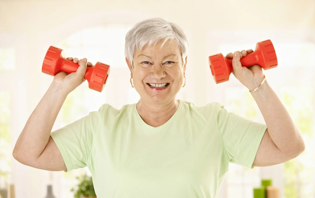 Senior performing standing shoulder press_Dumbbell Exercises At Home For Seniors