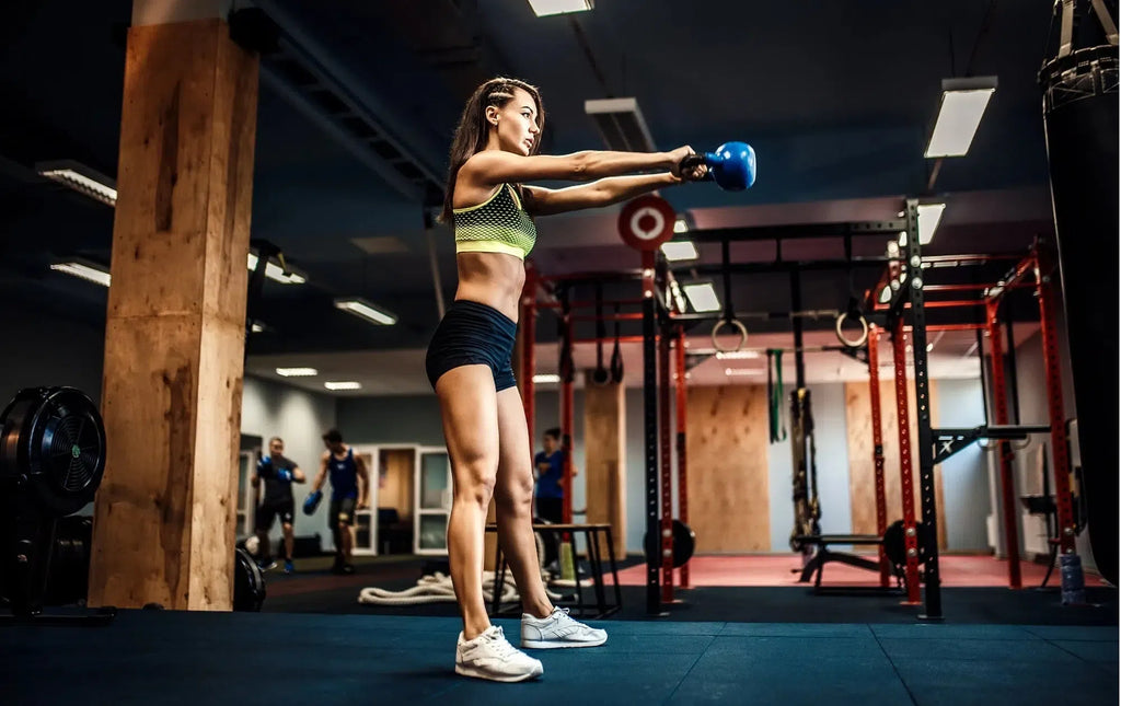 Woman doing kettlebell swing