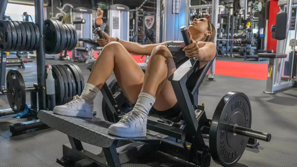 girl working out on hip thrust machine