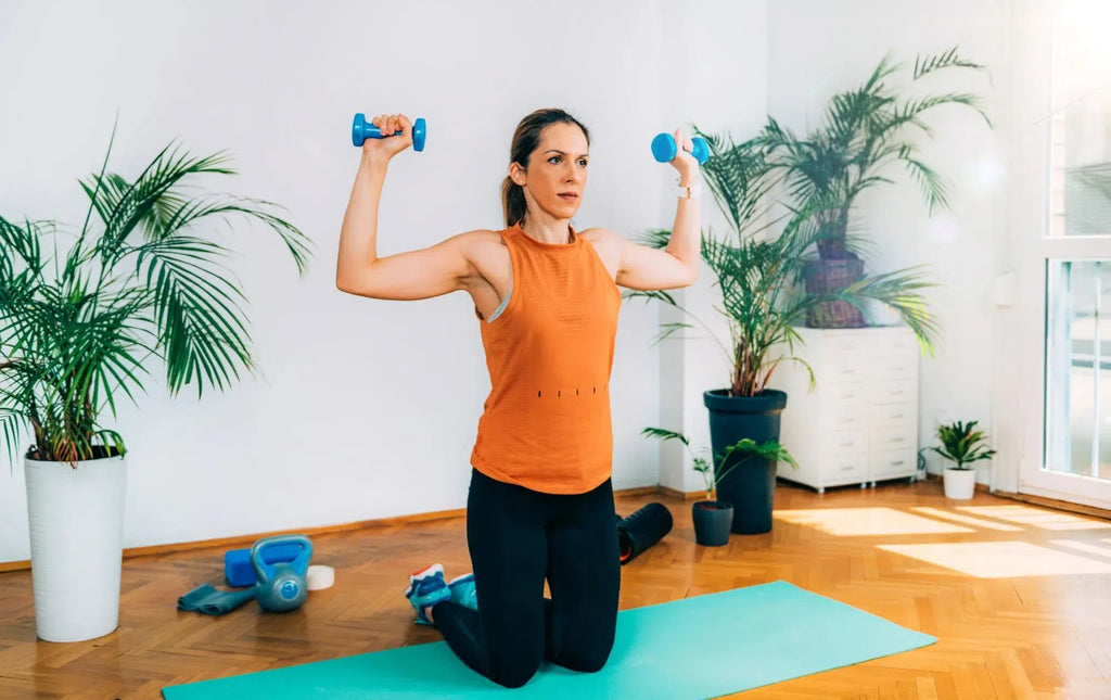 Woman lifting Dumbbells